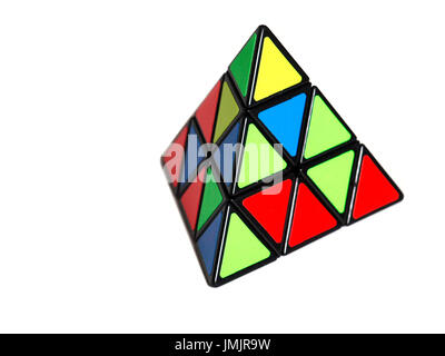 Rubik`s cube in a shape of a pyramid isolated on white background Stock Photo